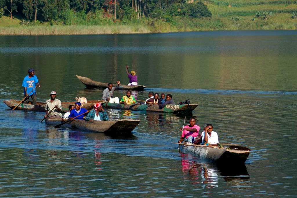 Enjoying a boat canoe on Lake Mutanda